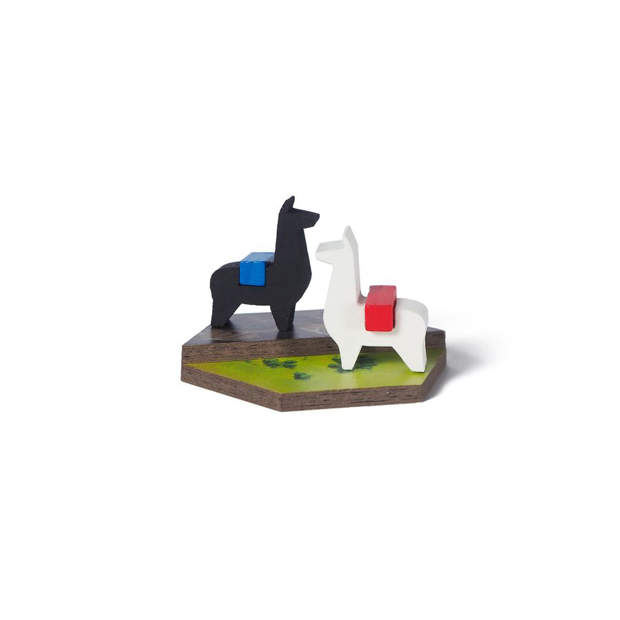 A game piece with two llama figures on it